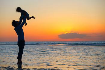 Family on the beach at Myrtle Beach Vacation Rentals.