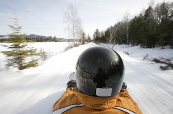 Snowmobiling at Northern Outdoors.