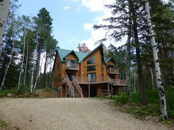 Cabin exterior at Deadwood Connections.