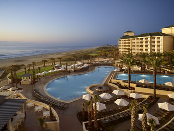 Outdoor pool and beach at Omni Amelia Island Plantation.