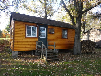 Exterior view of cabin at Twin Oaks Resort & RV Park.