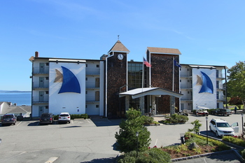 Exterior view with ocean in the background at Atlantic Oceanside Hotel & Conference Center.